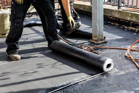 Can Asphalt Roof Coating Help You Avoid a Full Roof Replacement?